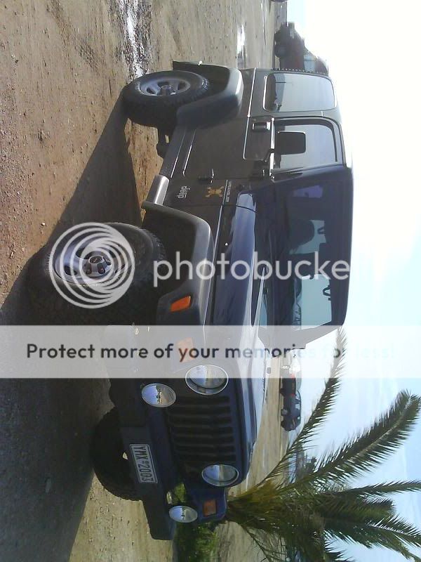 pictures or a Tj wrangler with 235/75/15 - JeepForum.com